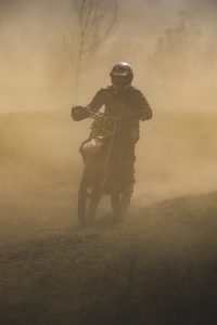 a man riding a motorcycle